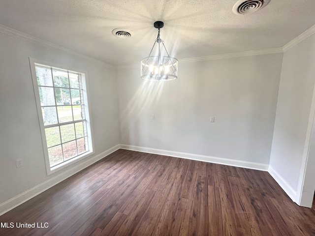 unfurnished dining area featuring a textured ceiling, dark hardwood / wood-style flooring, plenty of natural light, and a notable chandelier