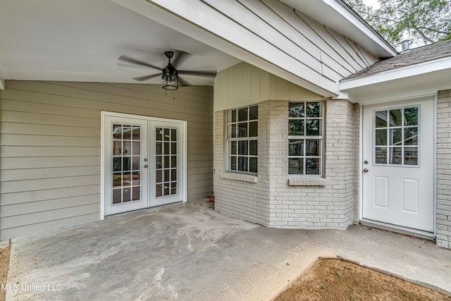 doorway to property with french doors, ceiling fan, and a patio area