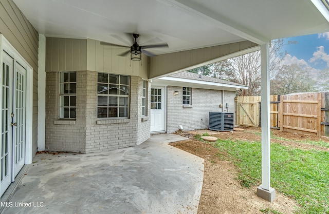 view of patio with ceiling fan and central air condition unit