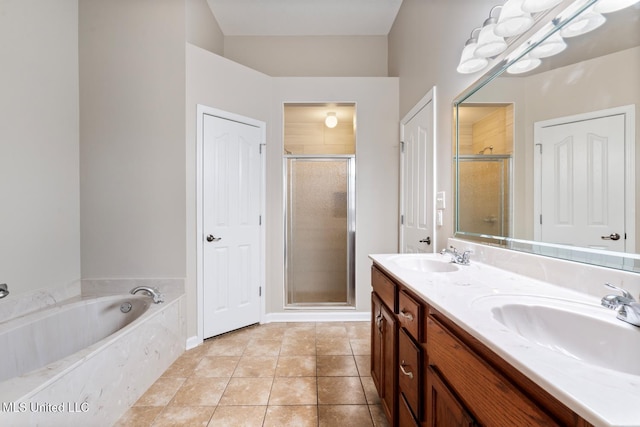 bathroom with separate shower and tub, tile patterned flooring, and vanity