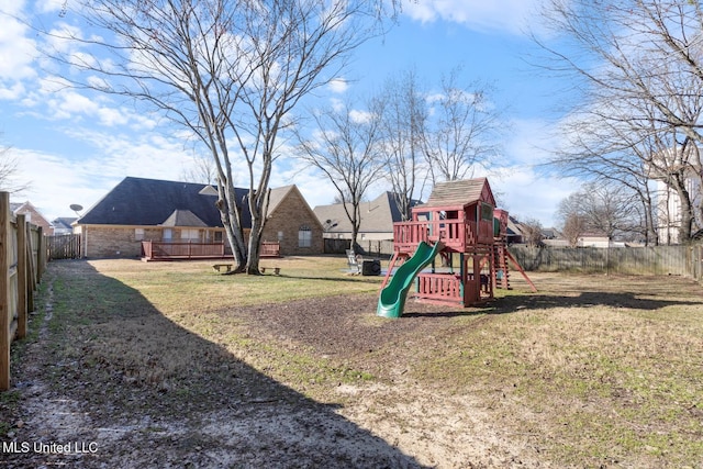 view of play area featuring a lawn