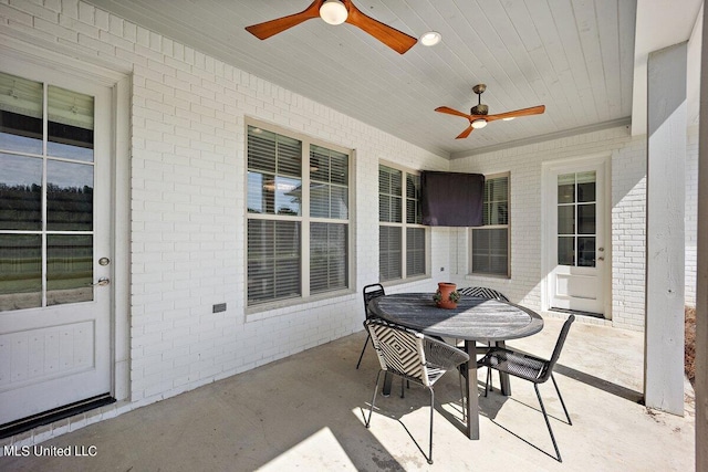 view of patio featuring ceiling fan