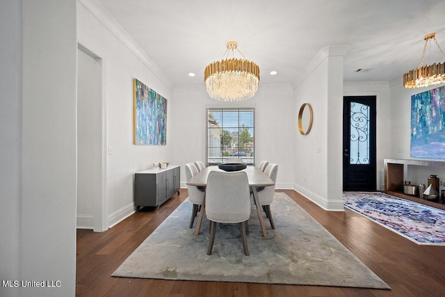 dining area featuring ornamental molding, a chandelier, and dark wood-type flooring