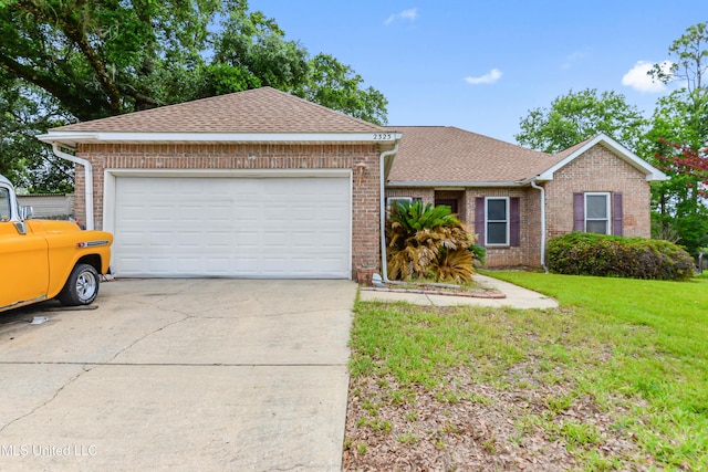 2325 Rue Beaux Chenes, Ocean Springs, MS 39564 - ranch-style house with brick siding, a shingled roof, and a front yard