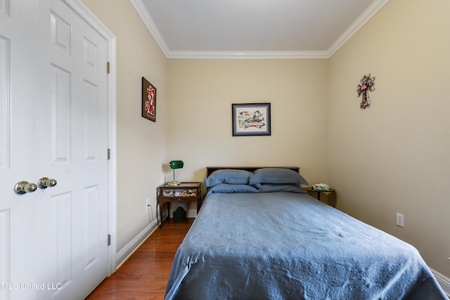 2325 Rue Beaux Chenes, Ocean Springs, MS 39564 - bedroom featuring ornamental molding, wood finished floors, and baseboards
