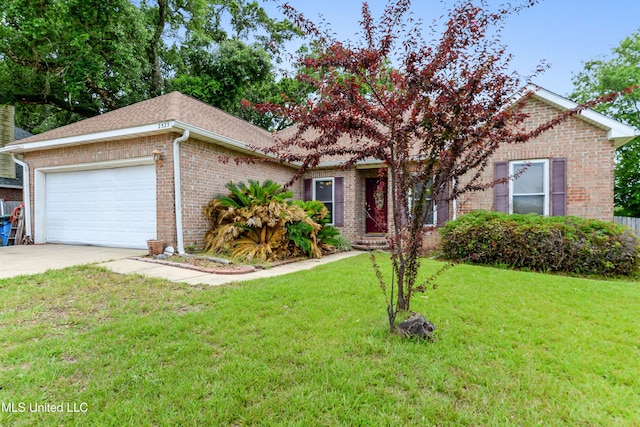 2325 Rue Beaux Chenes, Ocean Springs, MS 39564 - view of front of property featuring brick siding, an attached garage, a front lawn, driveway, and roof with shingles