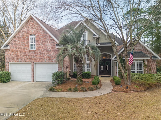 view of front of home featuring a garage and french doors