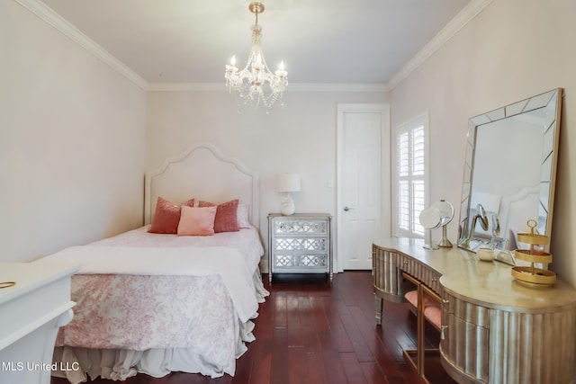 bedroom with ornamental molding, a notable chandelier, and dark hardwood / wood-style flooring