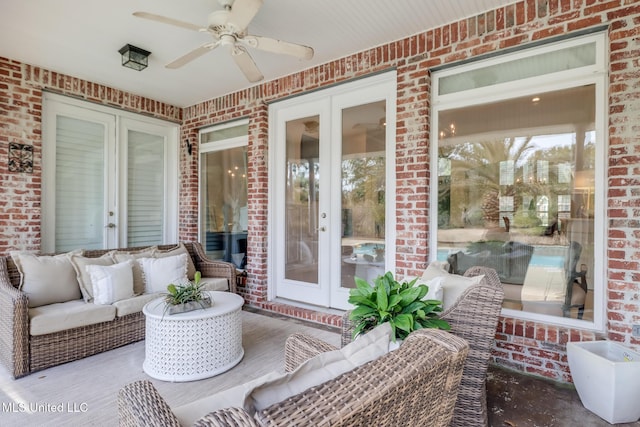 view of patio featuring outdoor lounge area, french doors, and ceiling fan