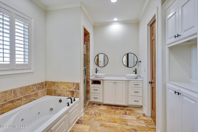 bathroom featuring ornamental molding, plus walk in shower, and vanity