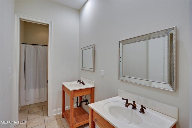 bathroom featuring tile patterned floors and vanity