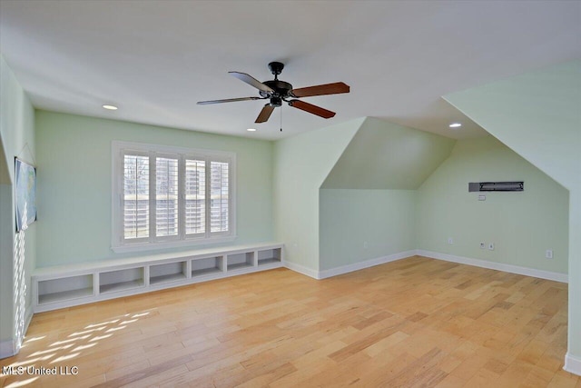 additional living space with lofted ceiling, ceiling fan, and light hardwood / wood-style floors