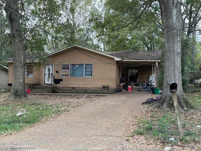 view of front of property with a carport