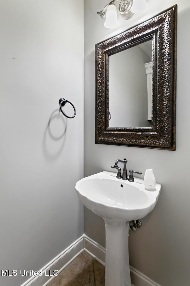 103 Maple Grv, Madison, MS 39110 - bathroom with baseboards and tile patterned flooring