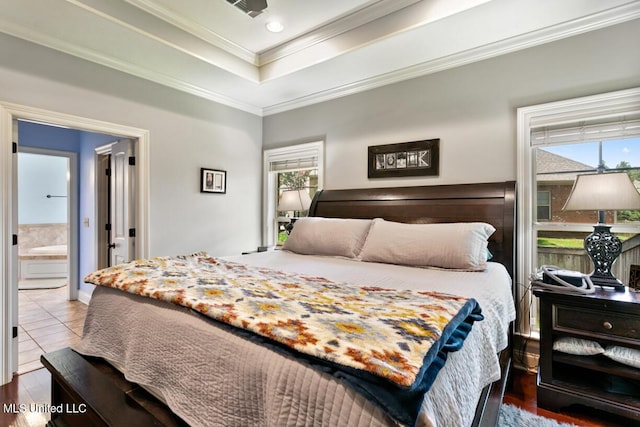 103 Maple Grv, Madison, MS 39110 - bedroom featuring ornamental molding, a raised ceiling, tile patterned floors, and ensuite bathroom