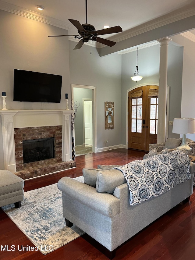 103 Maple Grv, Madison, MS 39110 - living area with ornamental molding, wood finished floors, a ceiling fan, a premium fireplace, and recessed lighting