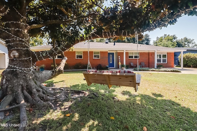 view of front of house with a front lawn