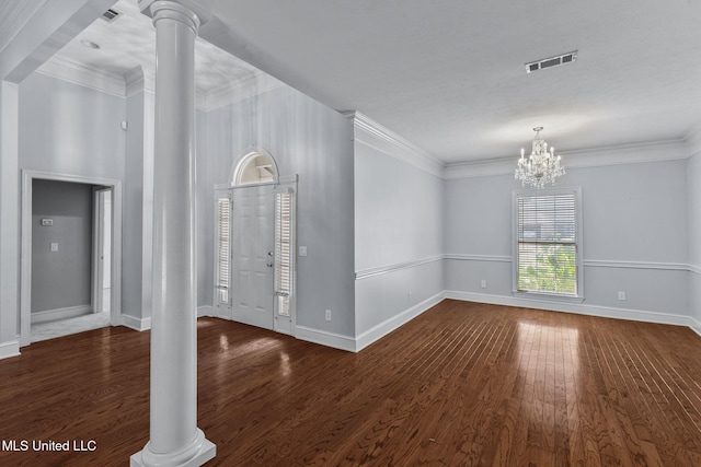 706 Danforth Dr, Madison, MS 39110 - unfurnished room with ornate columns, baseboards, crown molding, a chandelier, and wood finished floors