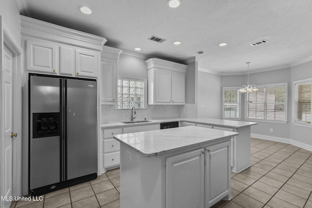 706 Danforth Dr, Madison, MS 39110 - kitchen with stainless steel fridge with ice dispenser, a sink, light tile patterned flooring, a kitchen island, and a peninsula