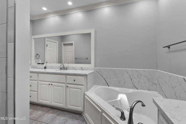 706 Danforth Dr, Madison, MS 39110 - full bathroom featuring crown molding, tile patterned floors, vanity, and a jetted tub