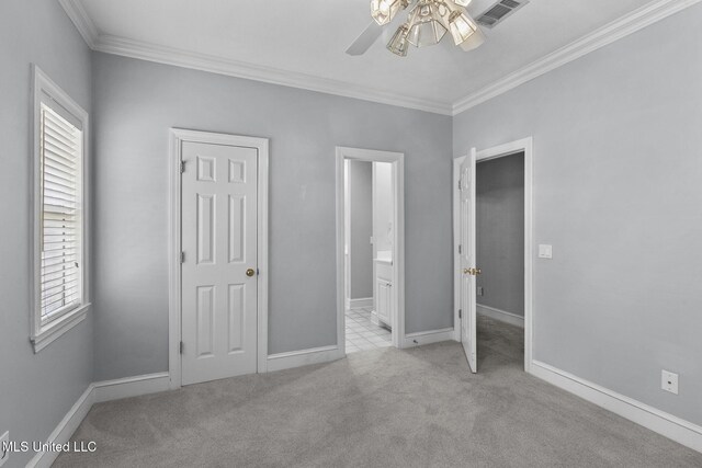 706 Danforth Dr, Madison, MS 39110 - unfurnished bedroom featuring ornamental molding, multiple windows, carpet floors, baseboards, and ensuite bath