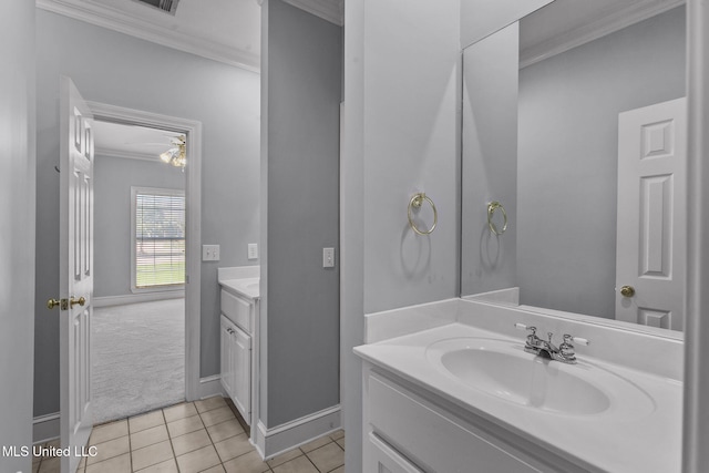 706 Danforth Dr, Madison, MS 39110 - bathroom with ornamental molding, vanity, tile patterned flooring, and baseboards