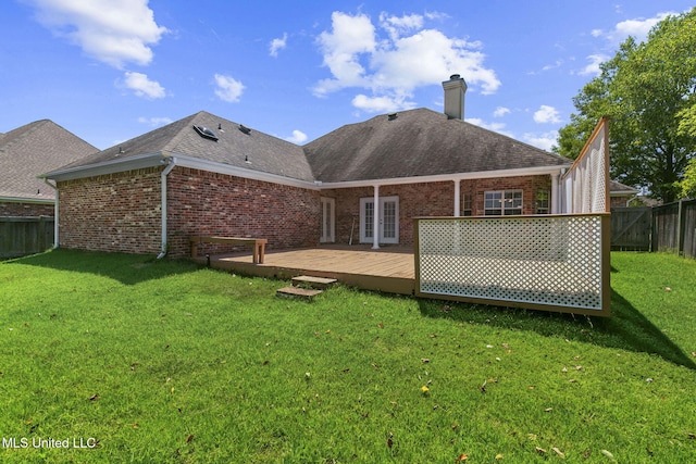 706 Danforth Dr, Madison, MS 39110 - back of house with brick siding, a wooden deck, a chimney, and a shingled roof