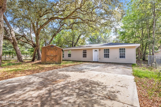 101 30th St, Gulfport, MS 39507 - view of front facade featuring driveway and a patio area