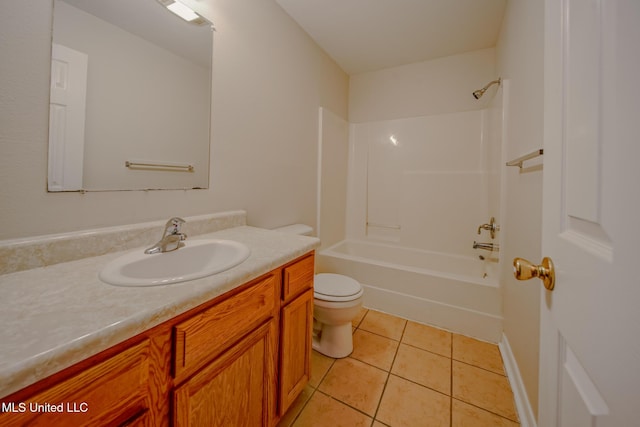 bathroom featuring tub / shower combination, vanity, toilet, and tile patterned floors