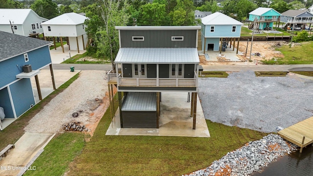 back of house with a balcony