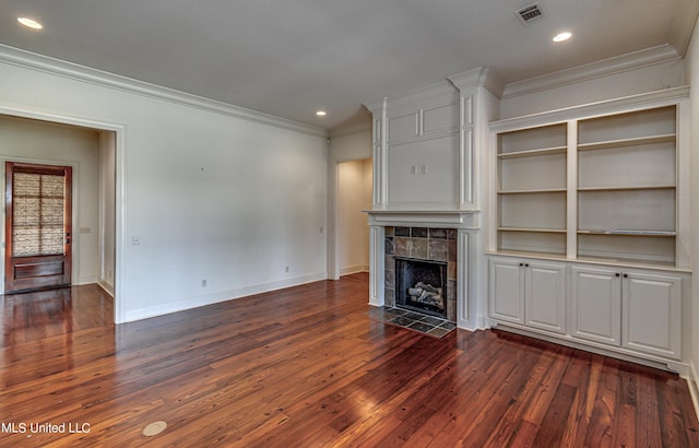 2024 E Northside Dr, Jackson, MS 39211 - unfurnished living room featuring dark wood-type flooring, visible vents, and ornamental molding