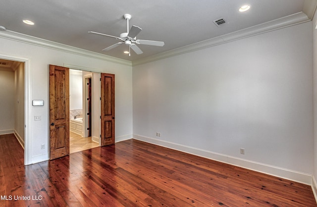 2024 E Northside Dr, Jackson, MS 39211 - unfurnished bedroom featuring baseboards, crown molding, dark wood-style floors, and recessed lighting