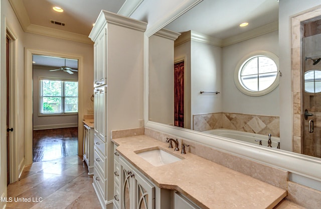 2024 E Northside Dr, Jackson, MS 39211 - full bathroom featuring a bath, visible vents, a shower with door, vanity, and ornamental molding