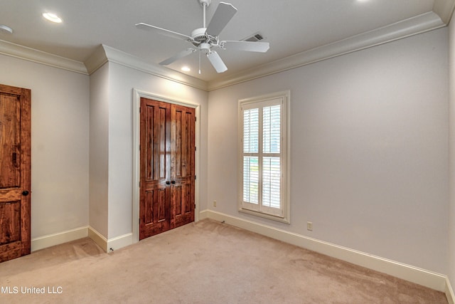 2024 E Northside Dr, Jackson, MS 39211 - entryway with baseboards, light colored carpet, and ornamental molding