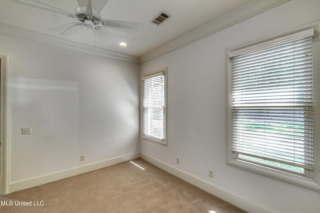 2024 E Northside Dr, Jackson, MS 39211 - spare room with baseboards, visible vents, light colored carpet, a ceiling fan, and ornamental molding