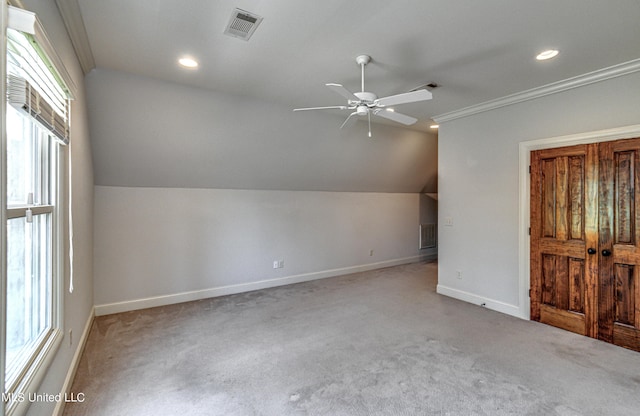 2024 E Northside Dr, Jackson, MS 39211 - bonus room featuring a ceiling fan, carpet floors, baseboards, lofted ceiling, and visible vents