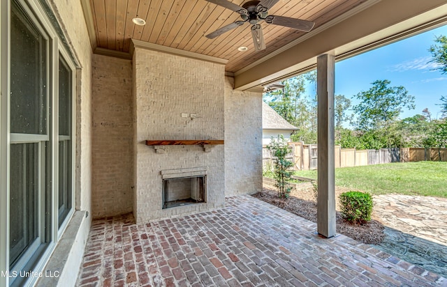 2024 E Northside Dr, Jackson, MS 39211 - view of patio featuring fence, ceiling fan, and an outdoor brick fireplace