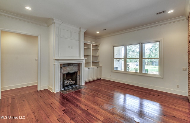 2024 E Northside Dr, Jackson, MS 39211 - unfurnished living room with a tile fireplace, baseboards, dark wood-type flooring, and ornamental molding