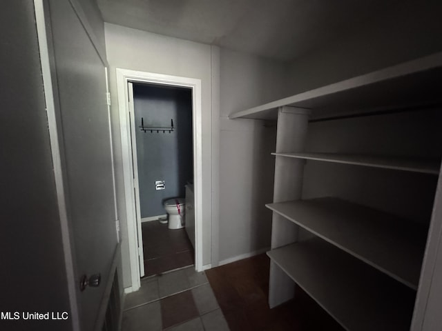 3327 Casa Grande Cir, Jackson, MS 39209 - spacious closet featuring dark tile patterned flooring