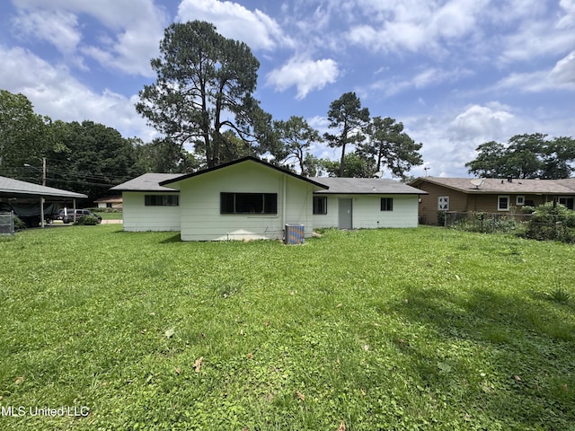 3327 Casa Grande Cir, Jackson, MS 39209 - back of house featuring a yard and cooling unit