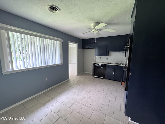 3327 Casa Grande Cir, Jackson, MS 39209 - kitchen featuring dark cabinetry, ceiling fan, tasteful backsplash, black appliances, and a textured ceiling