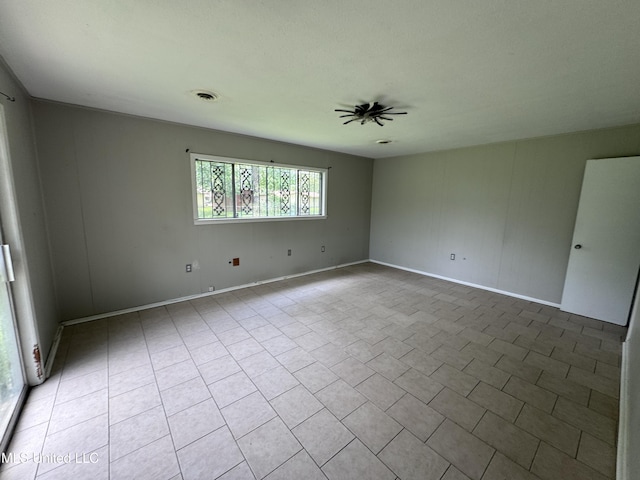 3327 Casa Grande Cir, Jackson, MS 39209 - empty room with a ceiling fan and baseboards