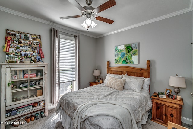 carpeted bedroom featuring crown molding and ceiling fan