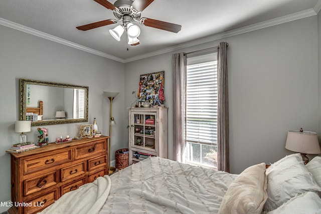 bedroom featuring ceiling fan and ornamental molding