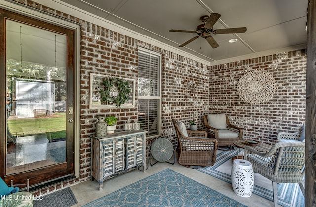 view of patio featuring ceiling fan