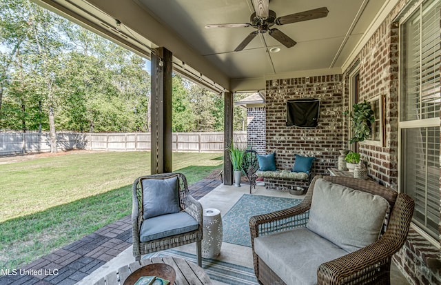 view of patio featuring an outdoor hangout area and ceiling fan