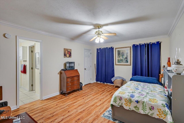 bedroom with crown molding, ceiling fan, and light wood-style flooring
