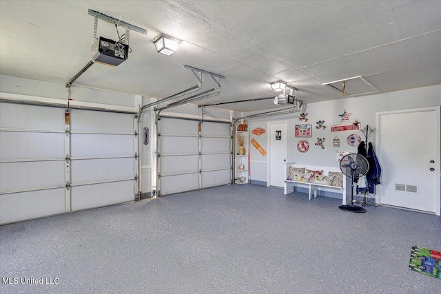 garage with a garage door opener
