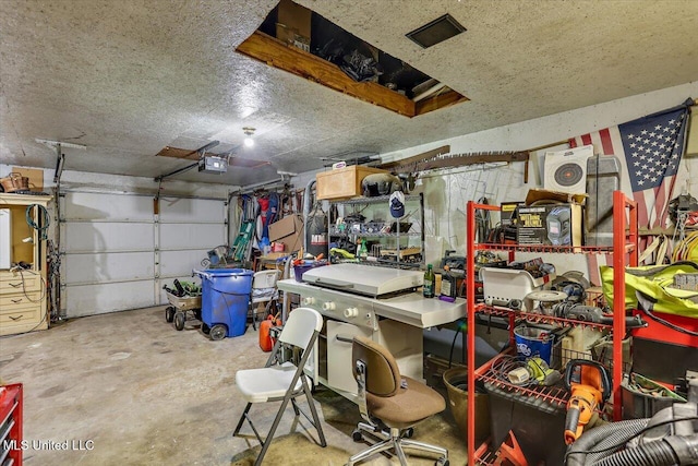 garage featuring a garage door opener
