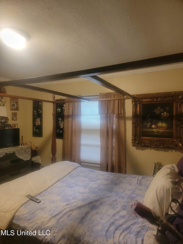 bedroom featuring a textured ceiling